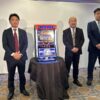 岡崎産業が創業75周年記念式典ならびにパチスロ新台「LBトリプルクラウン」の発表会を開催